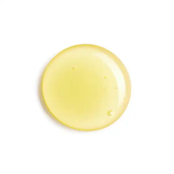 Round drop or bubble of yellow liquid.