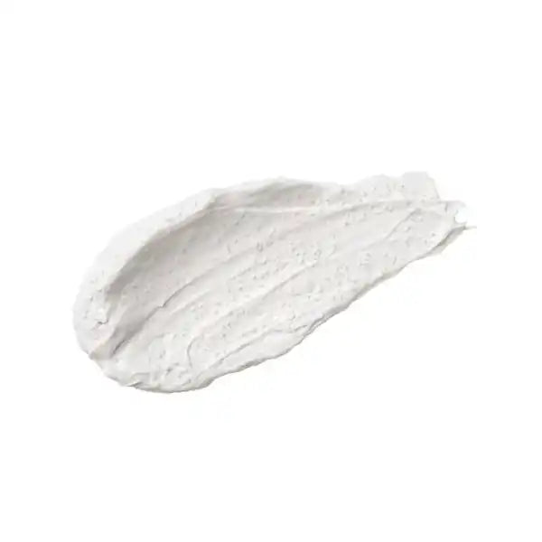 White cream or moisturizer smear with a textured surface.